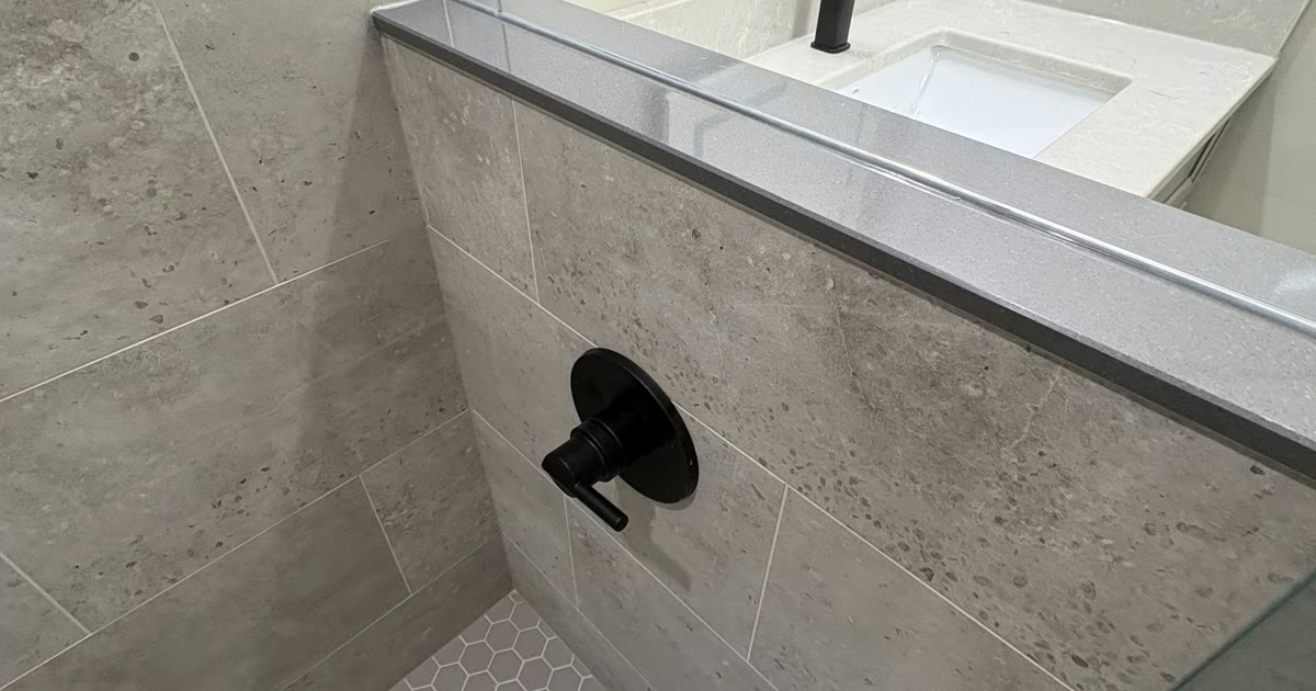Bathroom hexagon tile shower — HandKind Construction, Brantford Ontario